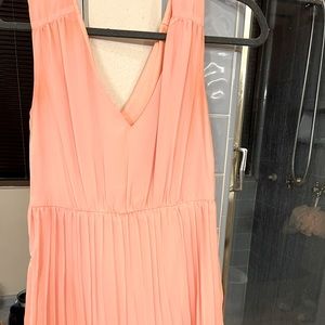 Peach pleated v neck dress